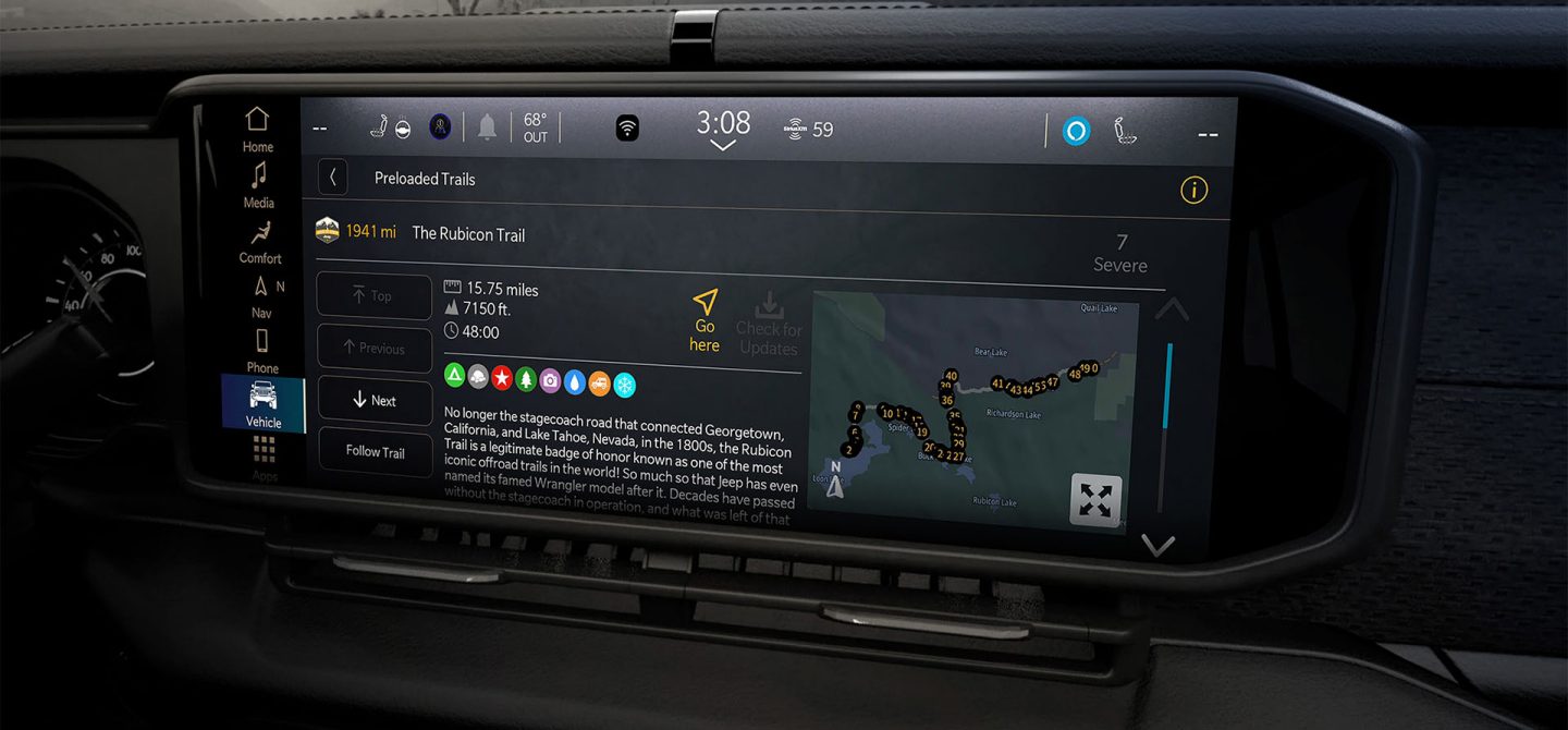 The Uconnect touchscreen in the 2025 Jeep Gladiator displaying one of the Off-Road Adventure Guides.